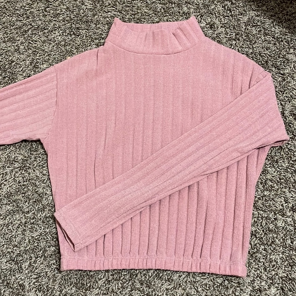 Pink turtleneck sweater
